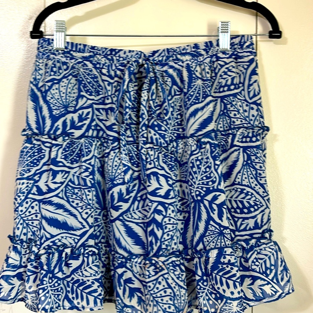 Blue and white polyester dress with lots of movement worn once